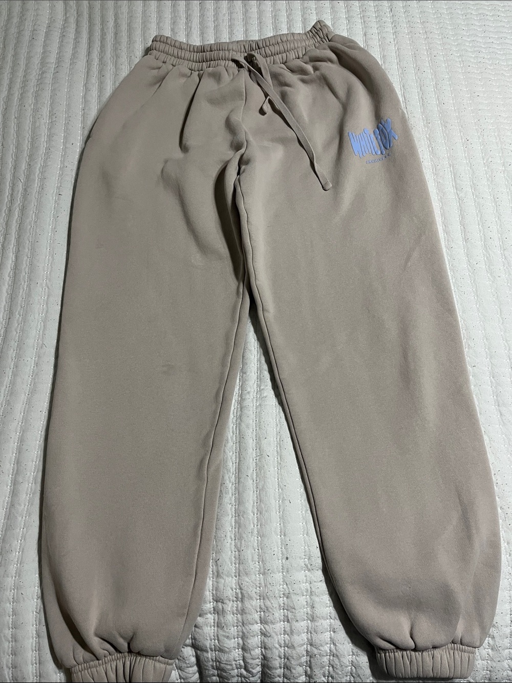 White Fox Boutique Beige Sweatpants with Light Blue Logo